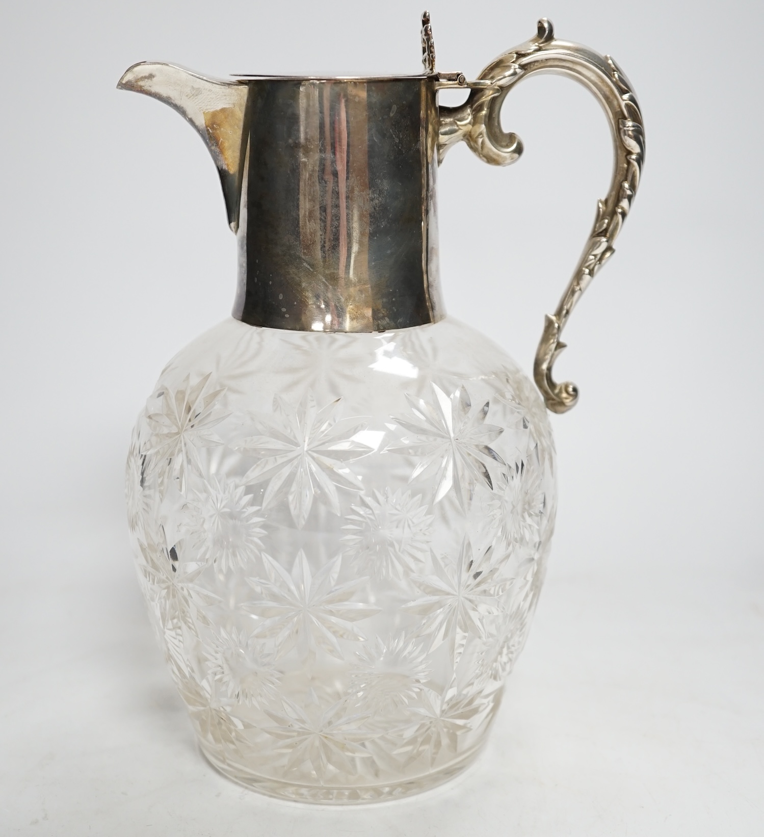 An Edwardian silver mounted cut glass claret jug, William Hutton & Sons, London, 1903, 21.8cm.
